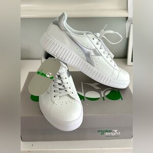 NWT and in box. Size 9.5 Diadora Game P Step shoes